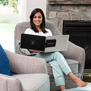 14-inch | Swivel | Sidetrak | Monitor Portable | Woman working from home sitting on living room char with 14-inch sidetrak swivel dual monitor set up on her lap