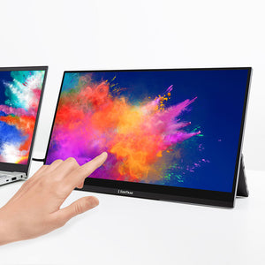 15.8 | HD | Touch | Solo Pro | Side track | Touch Screen Monitor | a dual screen set up with a Solo Touch HD 15.6 monitor attached via cord to the right side of a laptop sitting on a table with a hand touching the right screen