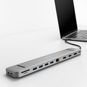 10 Port | Docking Station | SideTrak | 10 Port Docking Station USB-C hub | SideTrak 10-Port 4k USB-C hub connected to a laptop on a white table with a white background