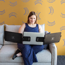 14" | Swivel | Sidetrak | Triple | Hub | Multi Monitor Setup | woman working on a 14 swivel triple monitor with hub on a couch