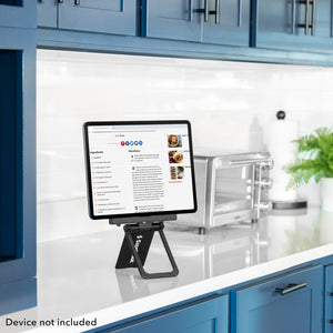 SideTrak | Tablet Mount | portable monitor mount with an ipad inside of the stand sitting on a kitchen counter showing a recipe