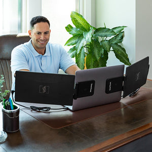 12.5" | Swivel | Triple | SideTrack | Triple Monitor Laptop | man working at a home office using a swivel 12 triple monitor 